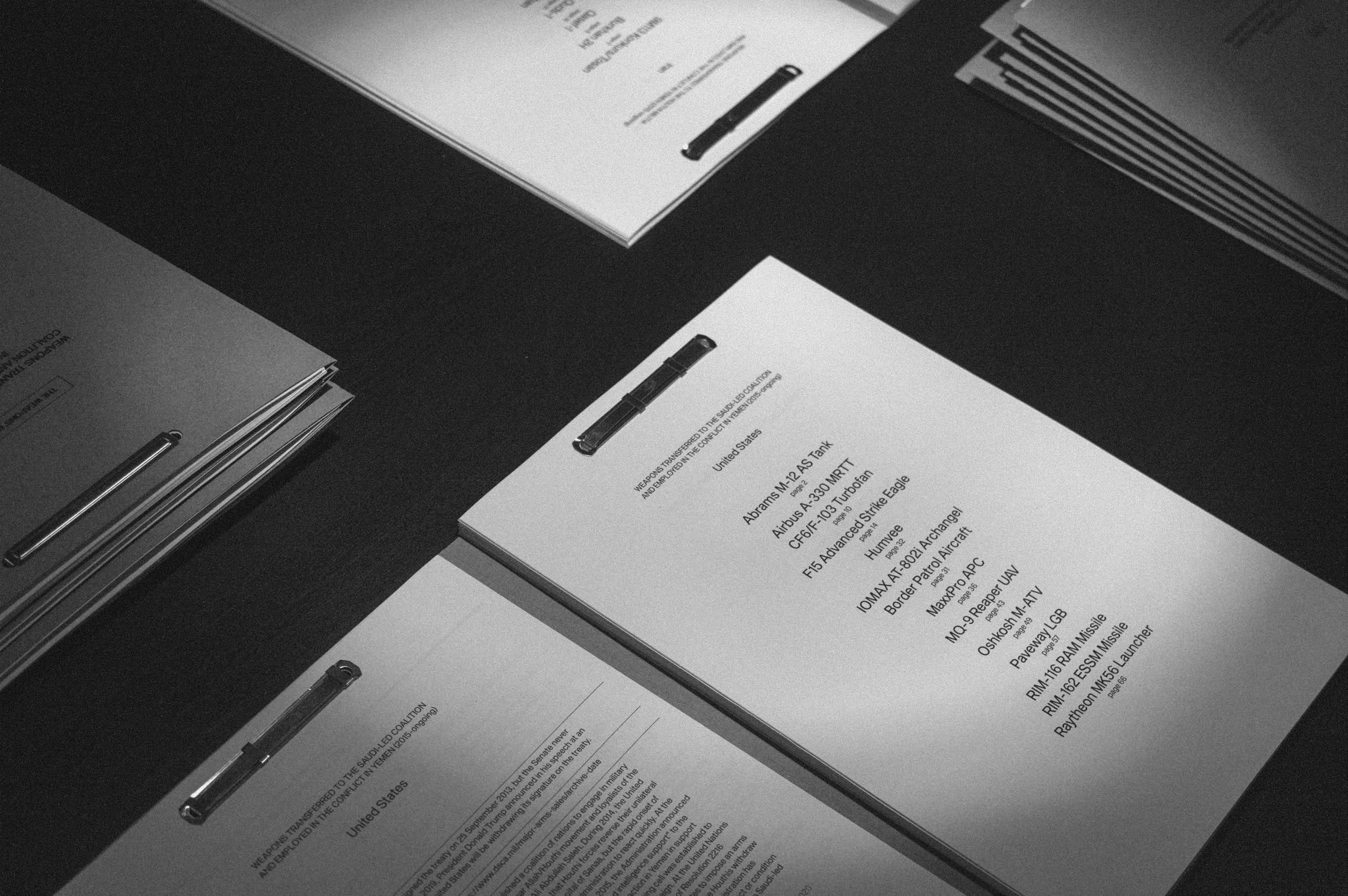 table setup documents folder weapons data information