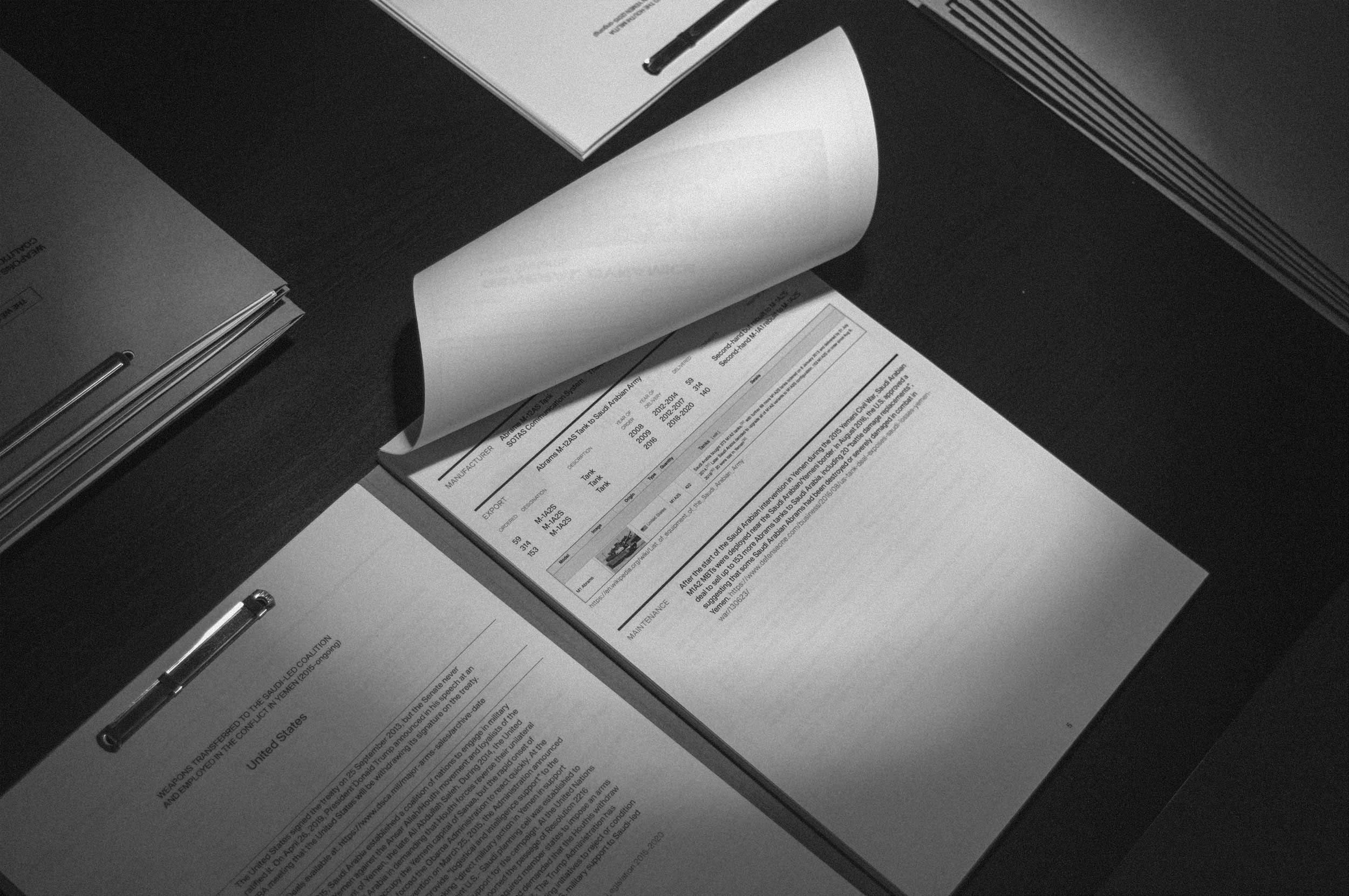 table setup documents folder weapons data information